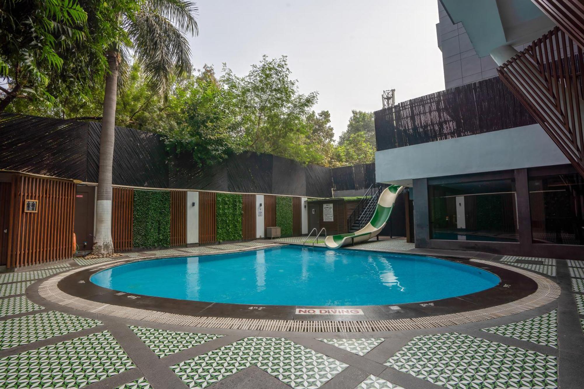 Park Inn By Radisson,South Delhi New Delhi Exteriör bild Swimming pool at the school